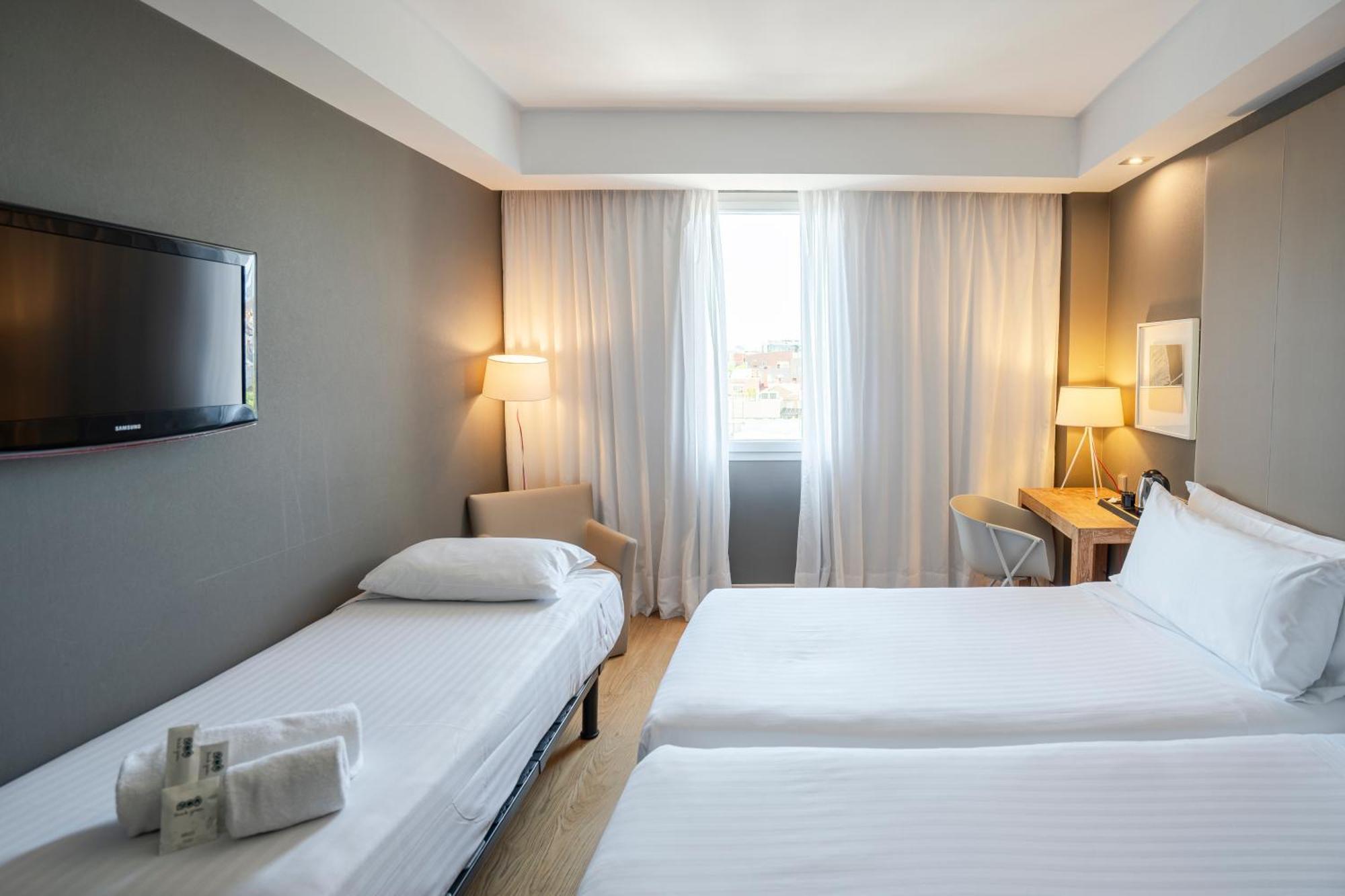 Camera Doppia con Letti Singoli con Letto Supplementare (2 Adulti + 1 Bambino)
